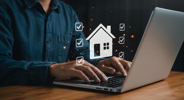Person reviewing a digital mortgage application on a laptop at a desk