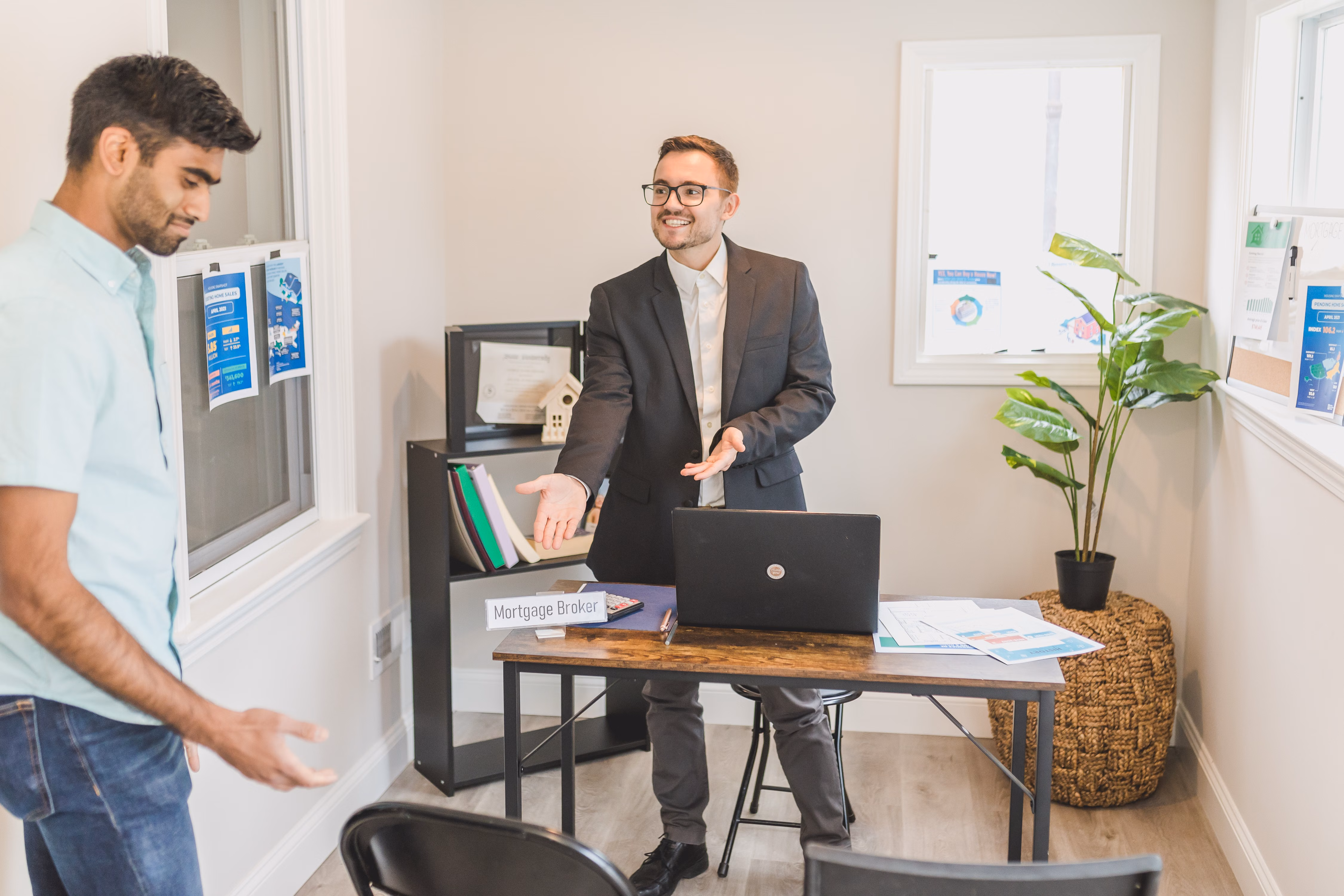Mortgage broker meeting with a client to review loan options