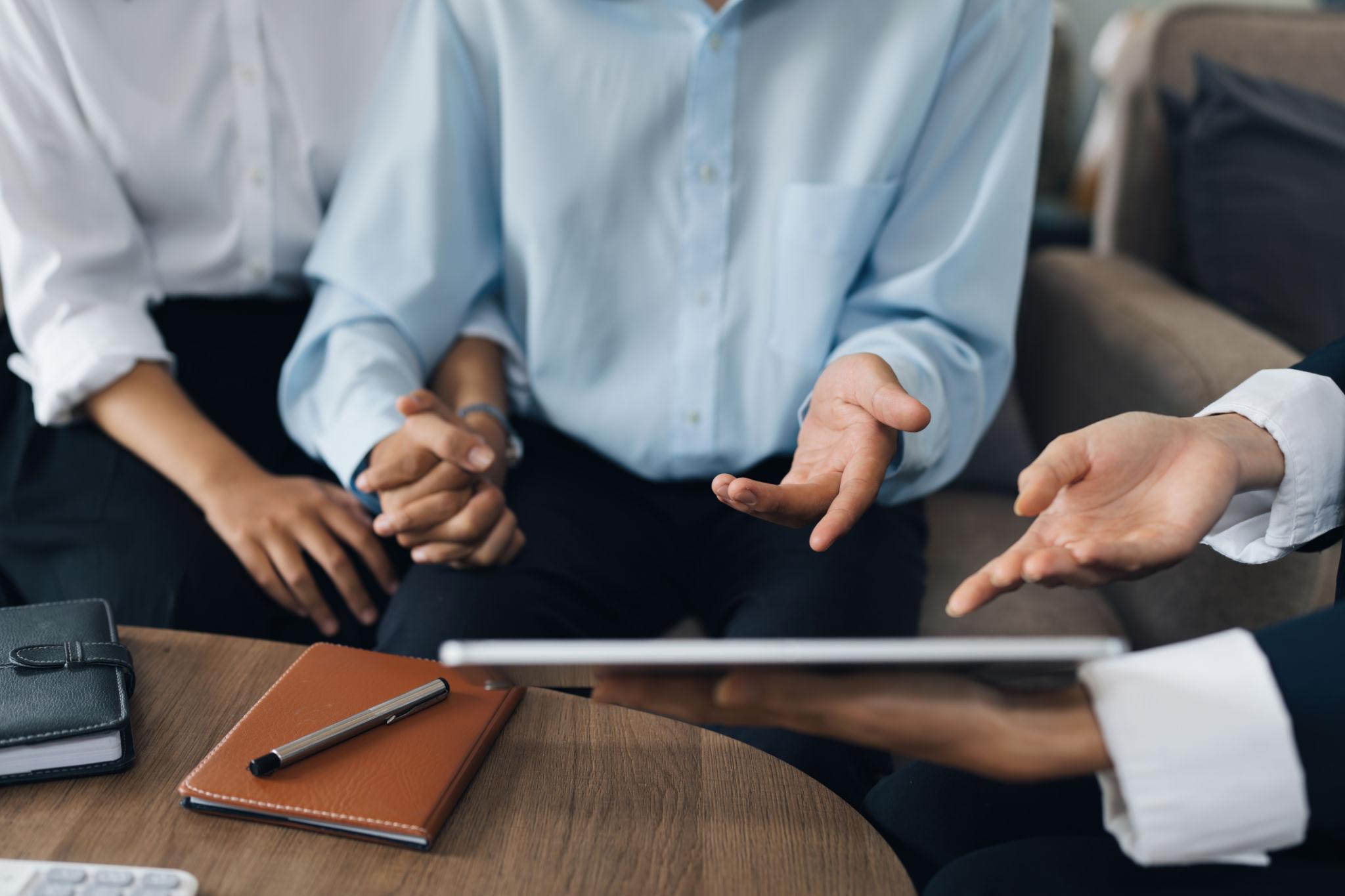Insurance agent reviewing lead qualification data on laptop